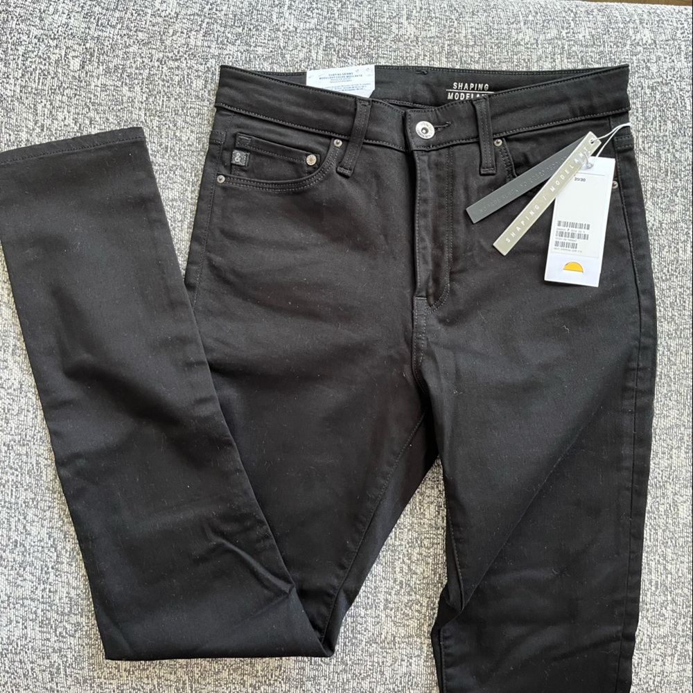 Brand new. H&M black shaping skinny jeans.